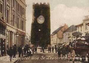 Interior of a modern space with a decorative floor and green accents.