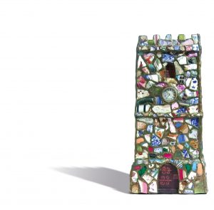 This mosaic model of St Leonard’s Tower was made in the mid-1920s by Harry Hodges of Teigngrace. Harry was a ‘keeper’ at Stover House (now Stover School). He probably saved the pieces of broken pottery from the kitchen of the grand house. Perhaps it was a project for the dark winter evenings?
