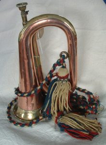 Joseph Baker, a bugle boy in the Devonshire Regiment, owned this military bugle. Joseph lost his life in the Somme in 1918. The bugle was used to call soldiers to arm themselves for battle.