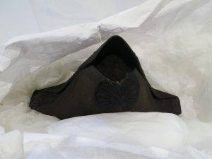 Also on display was this bicorn hat, widely adopted in the 1790s in British military and naval officer’s uniforms. This early example is made from felt and lined with silk and is in extremely good condition. Seen here being carefully packed away